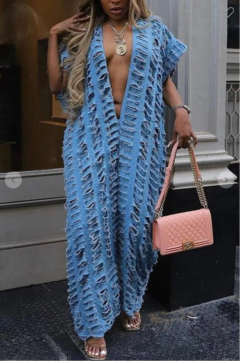 Jean jumpsuit with holes