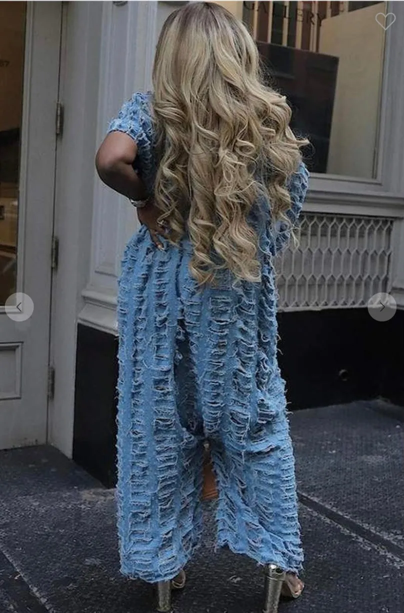 Jean jumpsuit with holes
