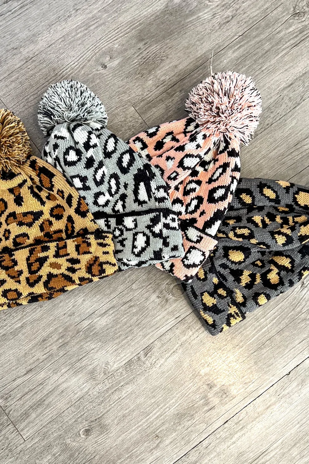 Leopard Print Beanie With Fur Puff On Top